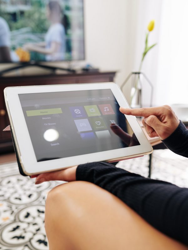 Woman using streaming media service application
